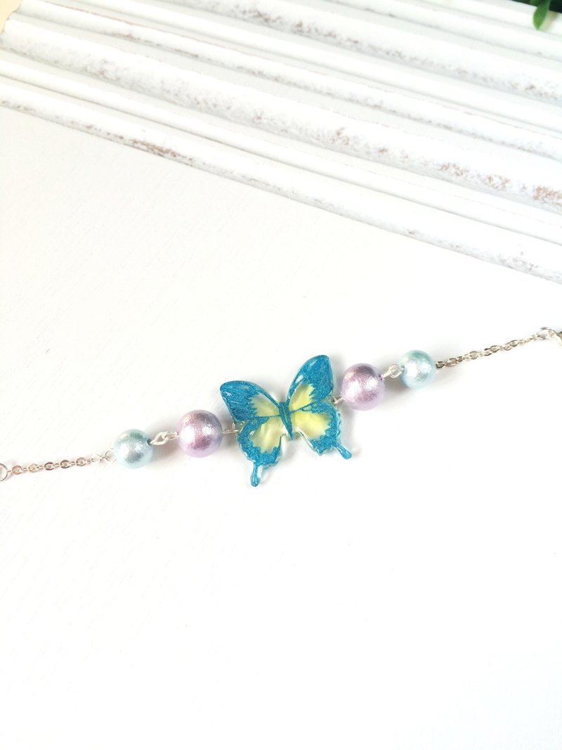 *Haku·Neko* 浅蓝色纹理手绘蝴蝶大棉棉珠手链 - 手链/手环 - 塑料 蓝色