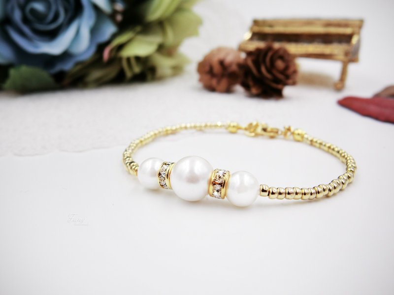 【简 Jane】珍珠贝施华洛手链 - 手链/手环 - 宝石 黄色