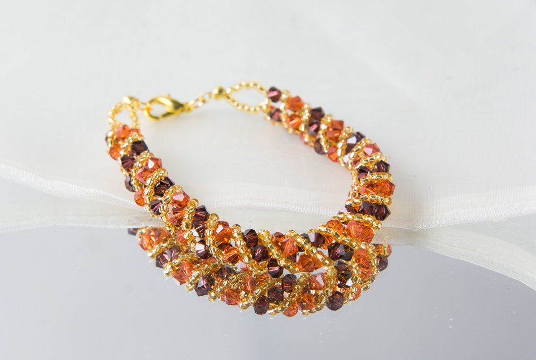 Orange and purple twisty swarovski bracelet, 7 inches and 2 inches chain - 手链/手环 - 水晶 橘色