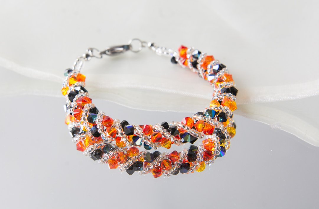 Orange and black twisty swarovski bracelet, 7 inches and 2 inches chain - 手链/手环 - 水晶 橘色
