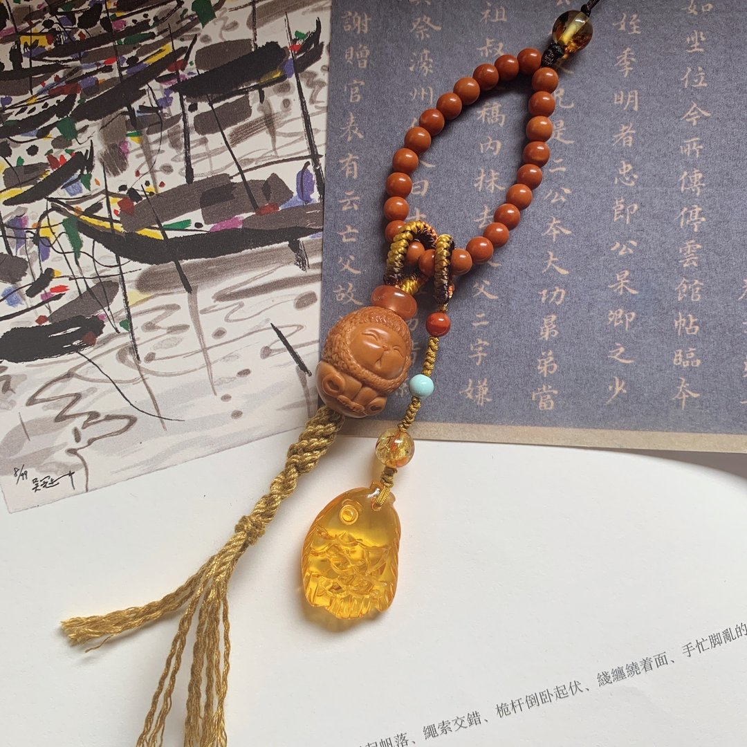 手作 遥遥。天然橄榄核狮子编织背包链 金珀南红跑圈核尖珠手机绳 - 挂绳/吊绳 - 其他材质 咖啡色