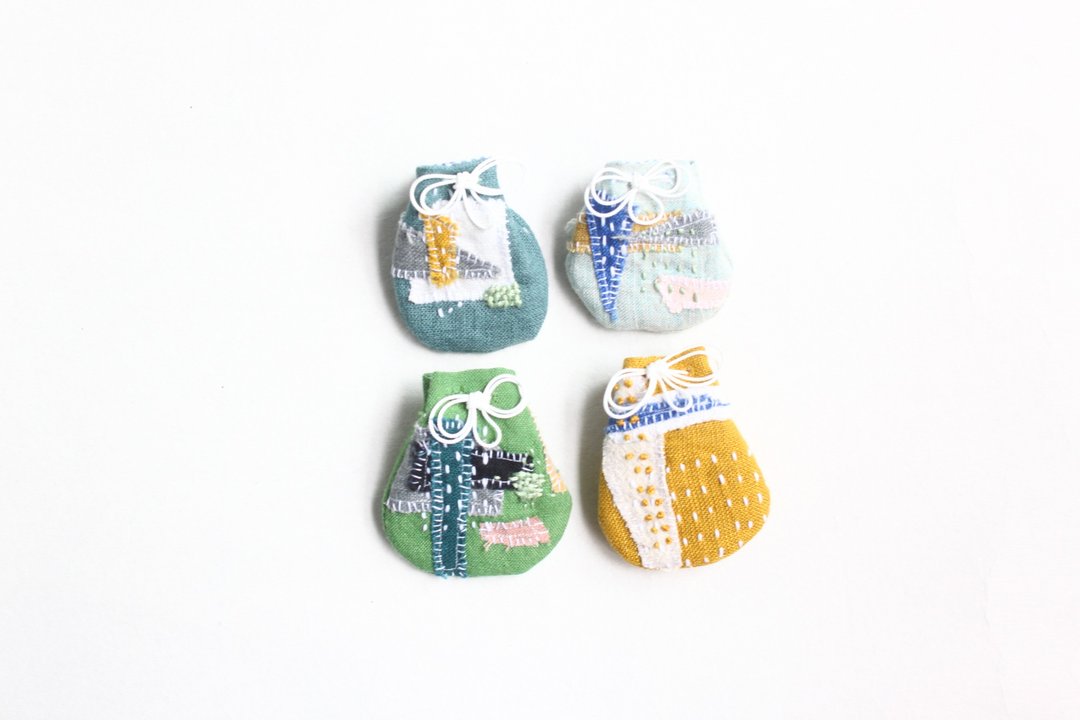 spica.g collageAmulet case - 化妆包/杂物包 - 棉．麻 绿色