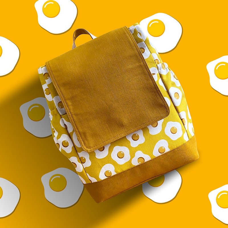 手工车缝egg跳舞鸡蛋图样绵布缀有牛皮后背包 - 后背包/双肩包 - 棉．麻 黄色