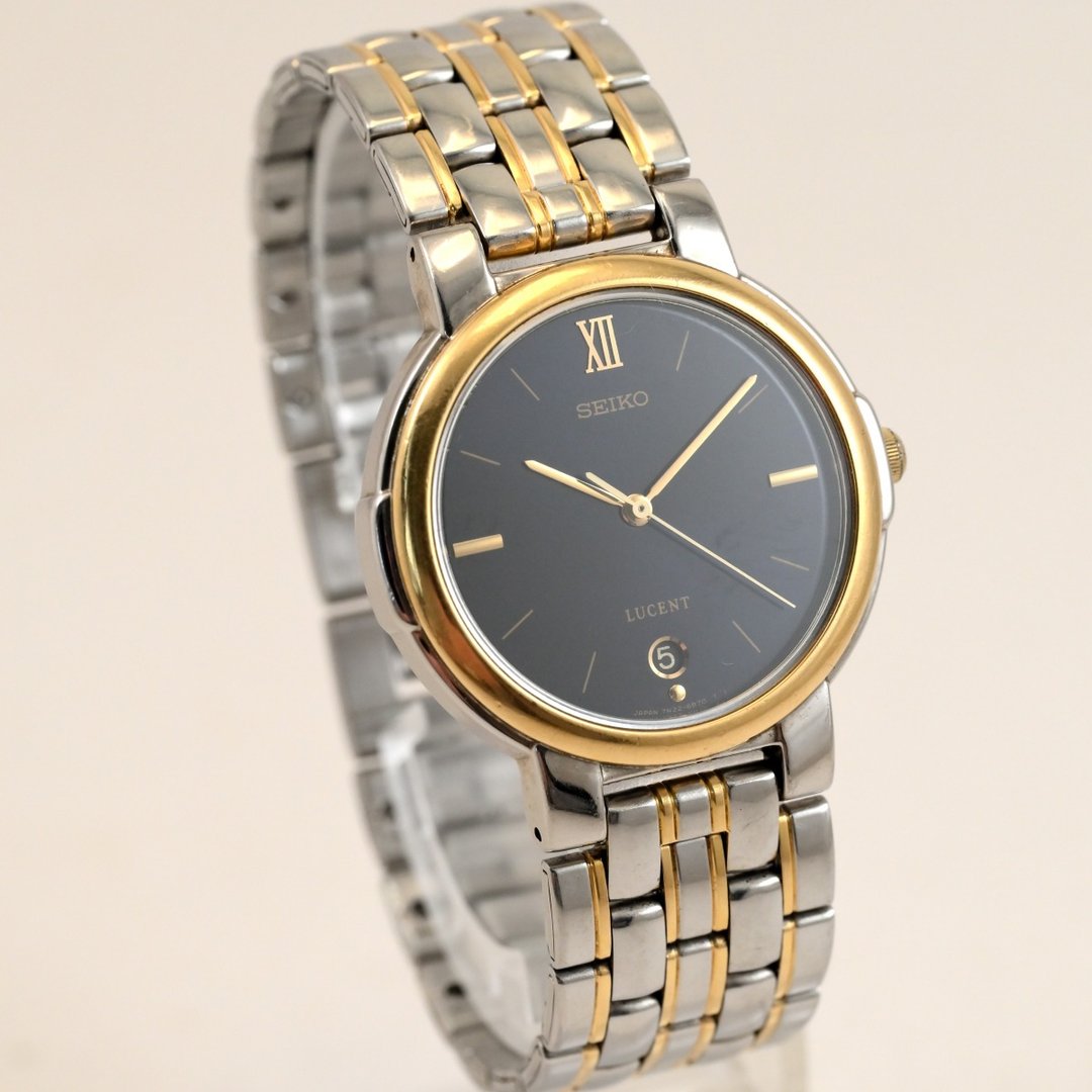 SEIKO LUCENT 7N22-6B20 适用于男女 1984年 深蓝表盘 日期显示 石英机芯 金银双色表带 手表 古董表 - 女表 - 不锈钢 蓝色