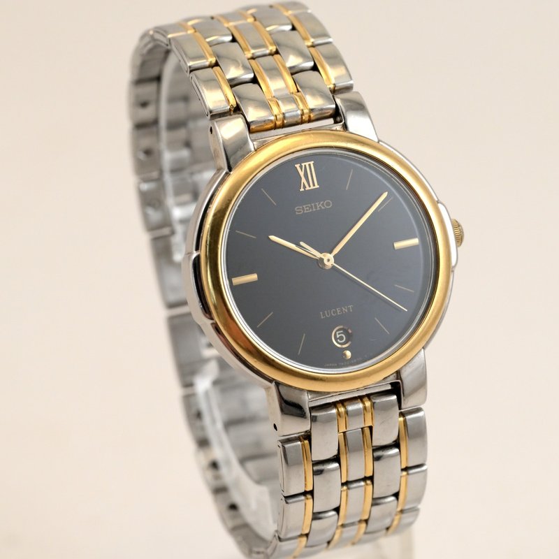 SEIKO LUCENT 7N22-6B20 男女通用 1984 深蓝表盘日期石英金银表带手表古董手表 - 女表 - 不锈钢 蓝色