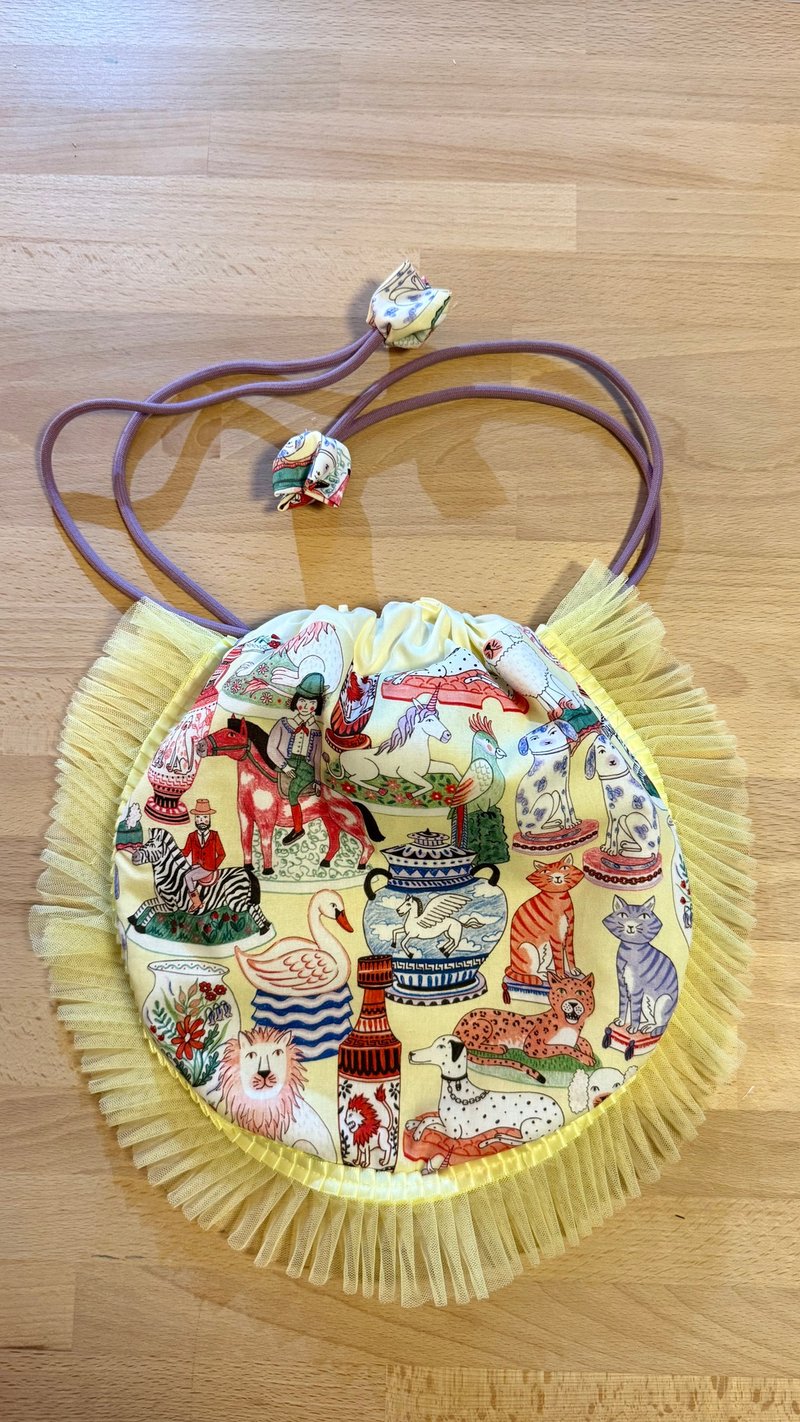 动物图案抽绳袋  纱边手作包 - 束口袋双肩包 - 棉．麻 黄色