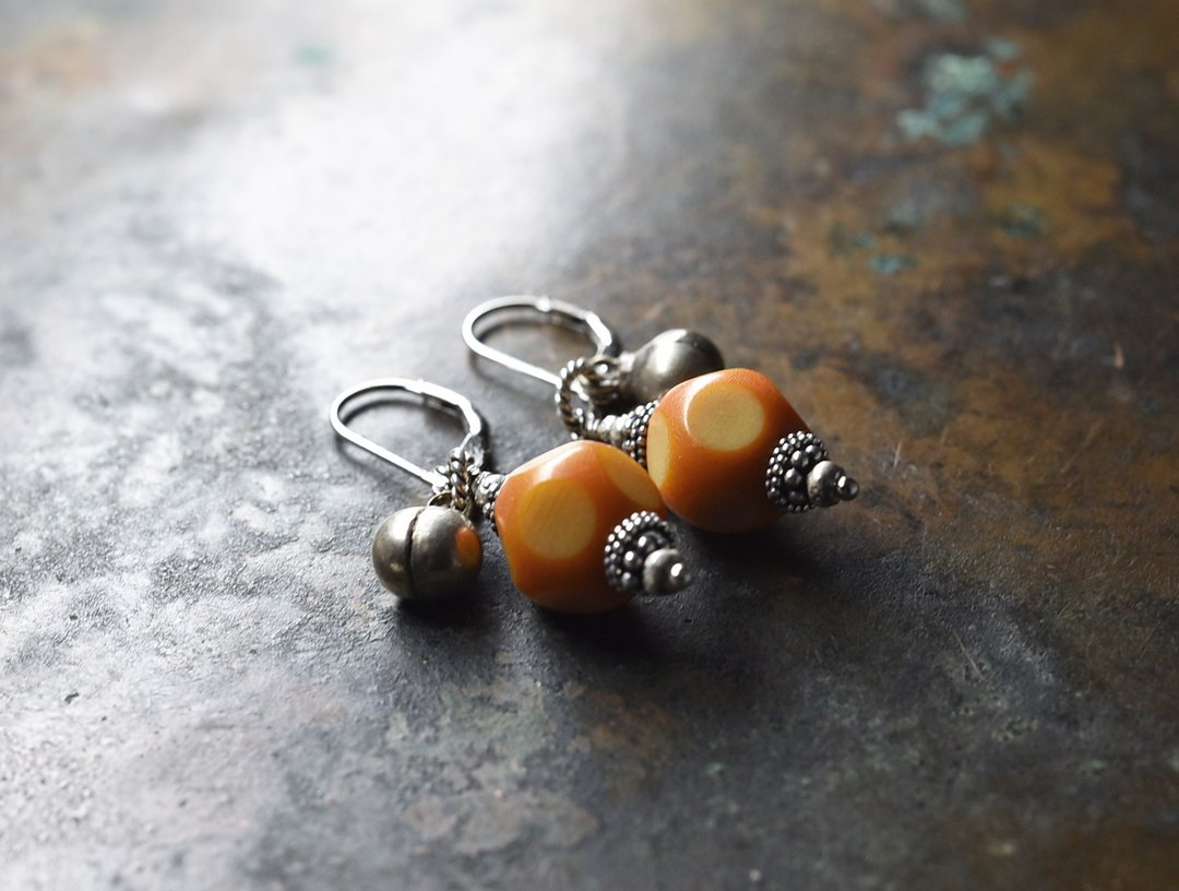 Silver earrings with polka dots African amber and folk bells - 耳环/耳夹 - 塑料 橘色