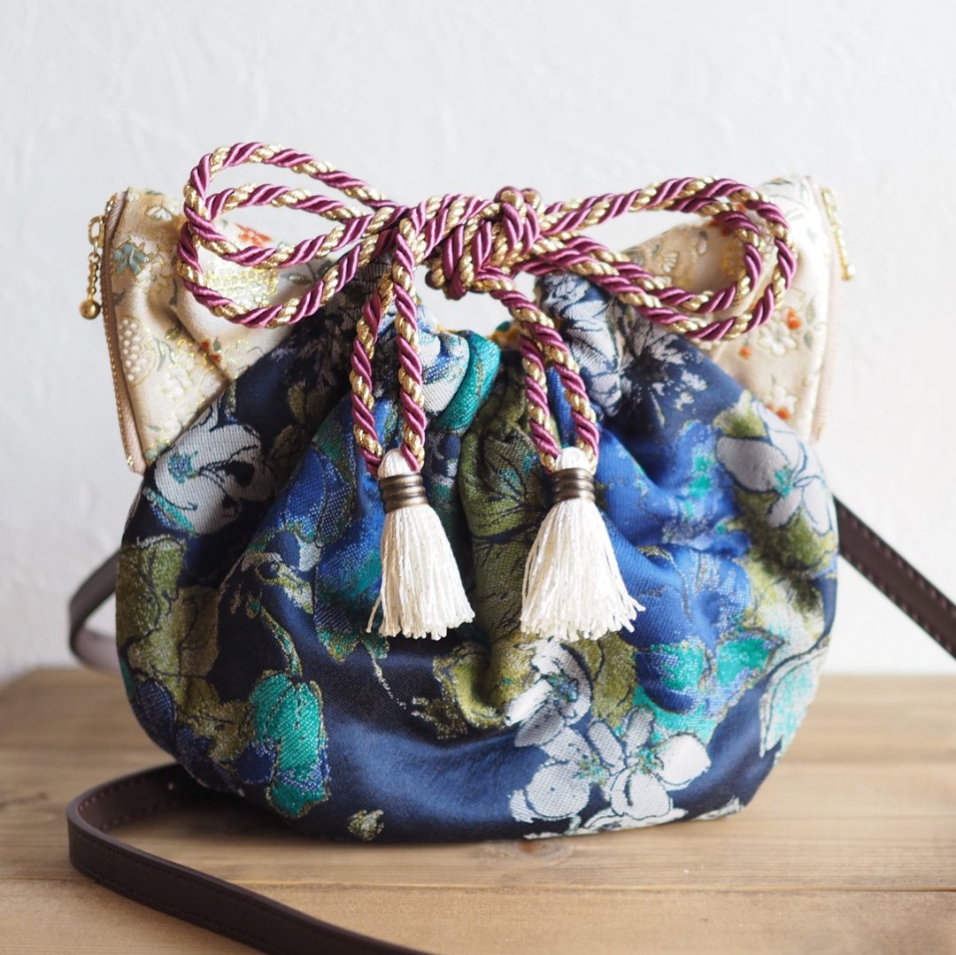 Jacquard woven cat type drawstring shoulder bag (one piece work / free shipping) - 侧背包/斜挎包 - 棉．麻 蓝色