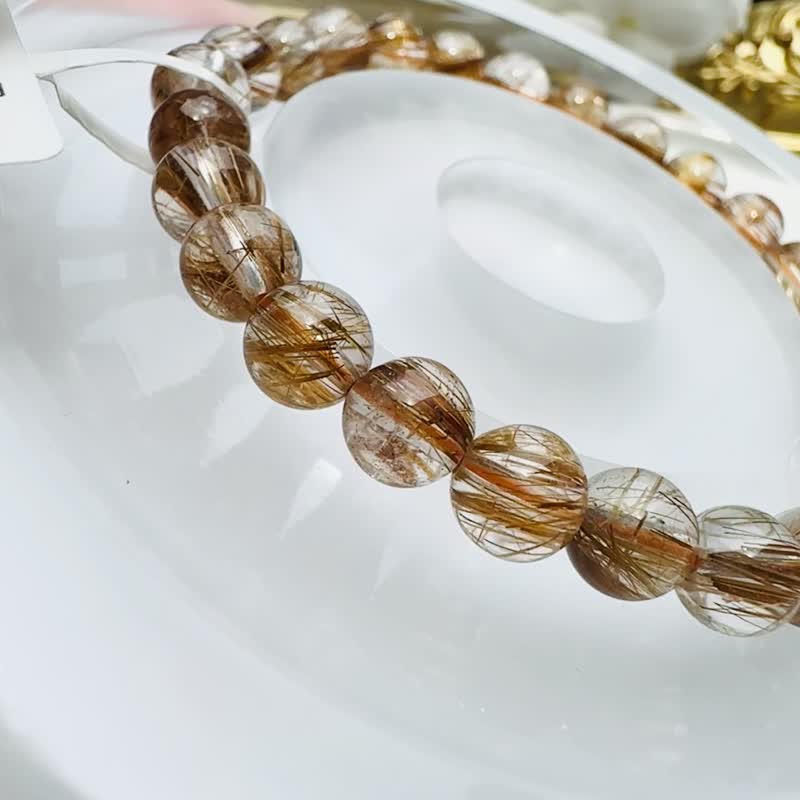 精品玻璃透金闪铜发晶 6.8-7.4mm13.66g 辟邪挡煞逢凶化吉化解浊气 - 手链/手环 - 水晶 金色
