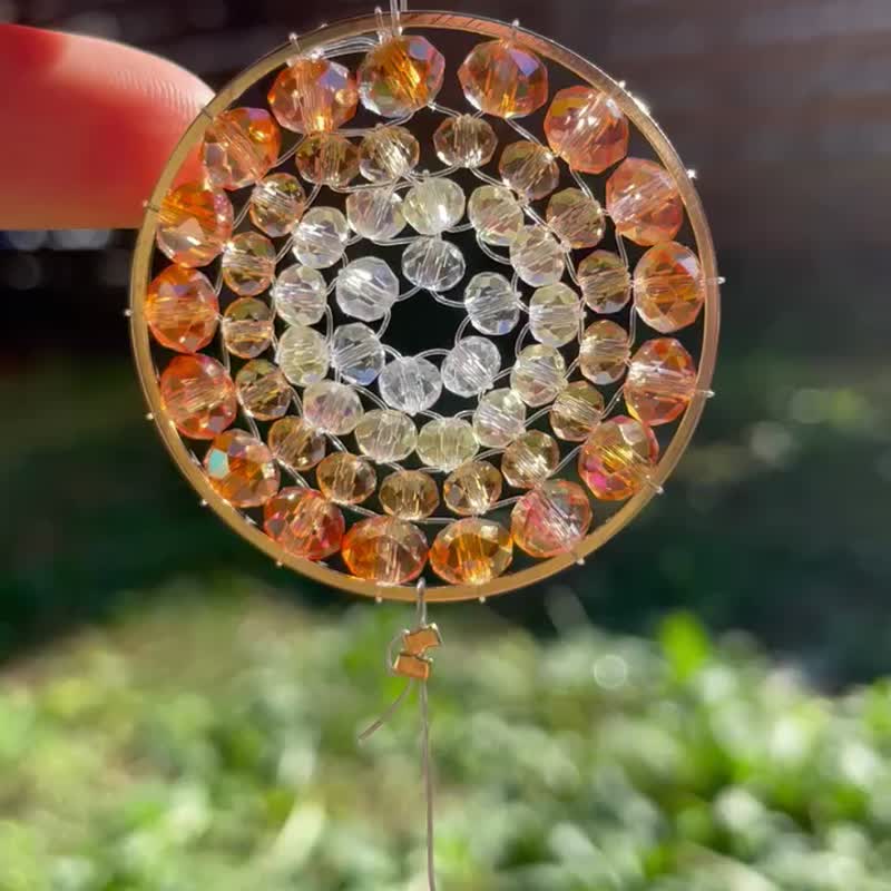 A shining orange color mandala made of glass beads. - 其他 - 玻璃 橘色