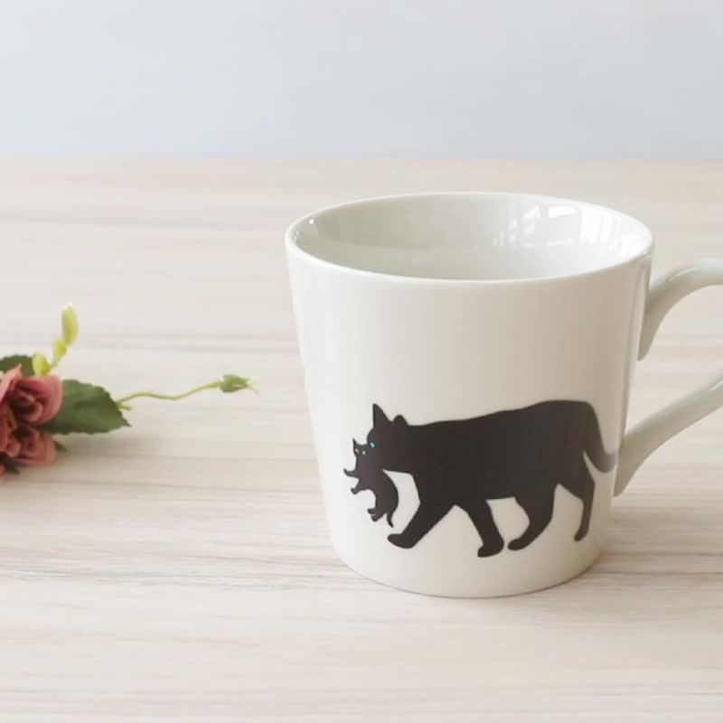 温感マグカップ　くわえる猫 - 咖啡杯/马克杯 - 陶 白色